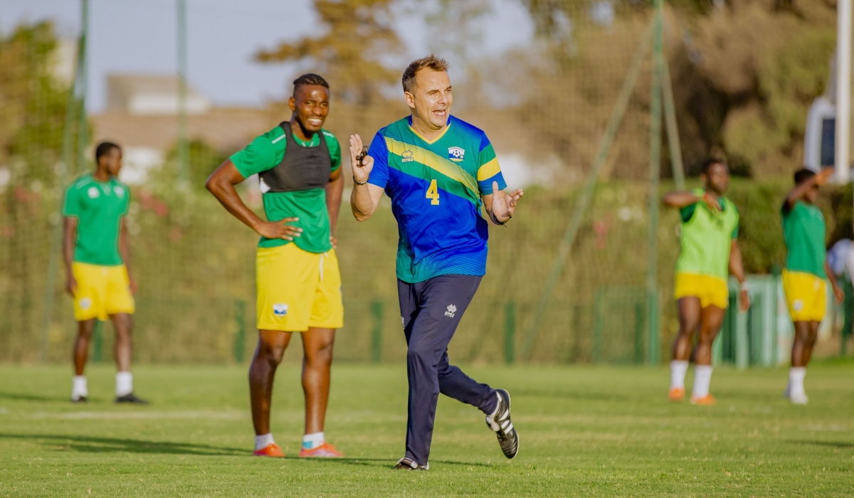 Former national football team head coach Carlos Ferrer gives instructions to the players during a training session. The new coach is expected to be announced next week. Courtesy