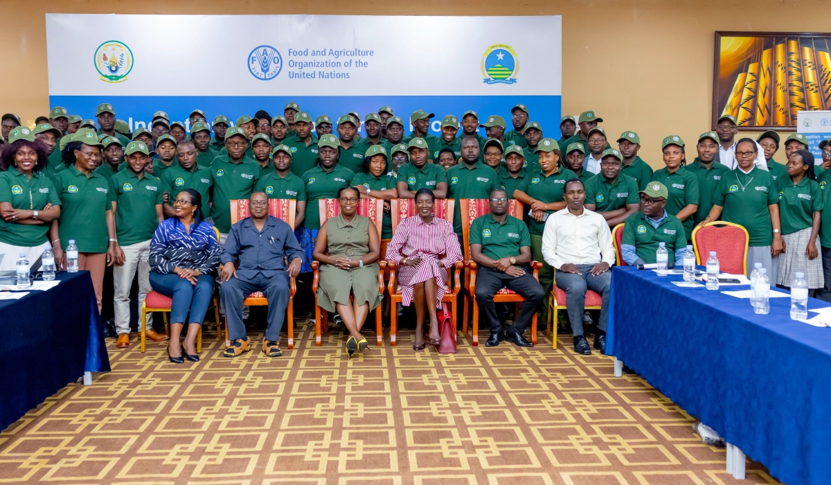 Participants and the officials pose for a group photo during the food security workshop