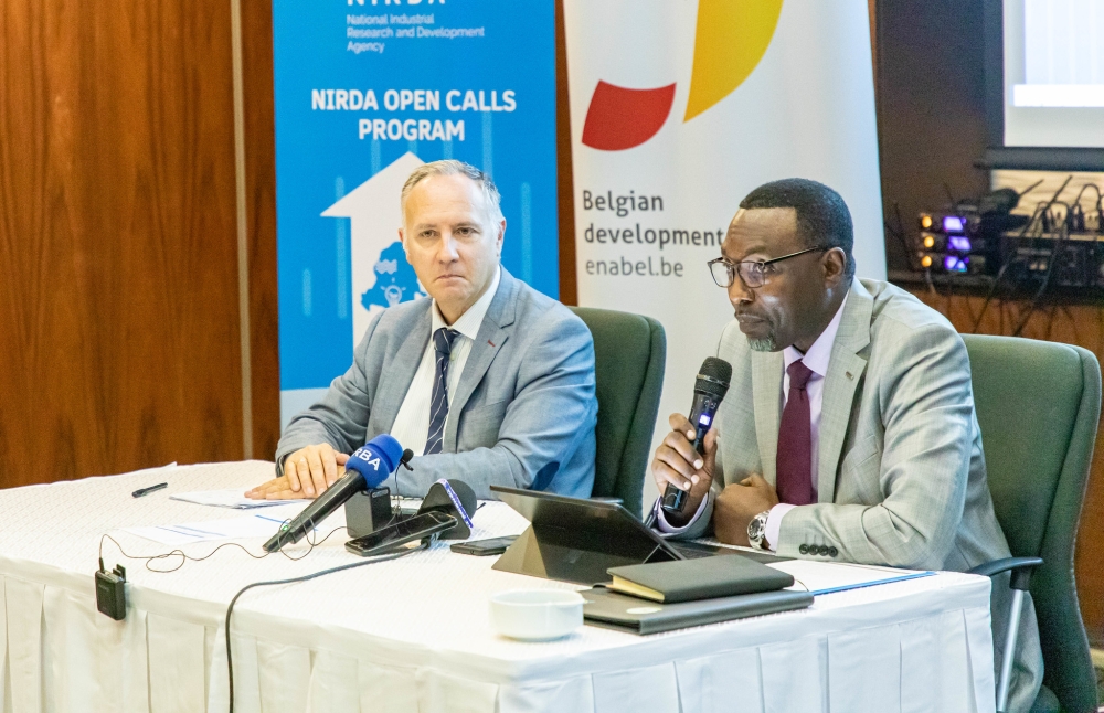 (L)Manuel Iglesias, the Country Portfolio Manager at Enabel, emphasized the positive and productive experience of collaborating with NIRDA , as the Director-General of NIRDA, Christian Sekomo Birame addresses media during a news briefing on Friday, October 27 .  Photo by Dan Gatsinzi