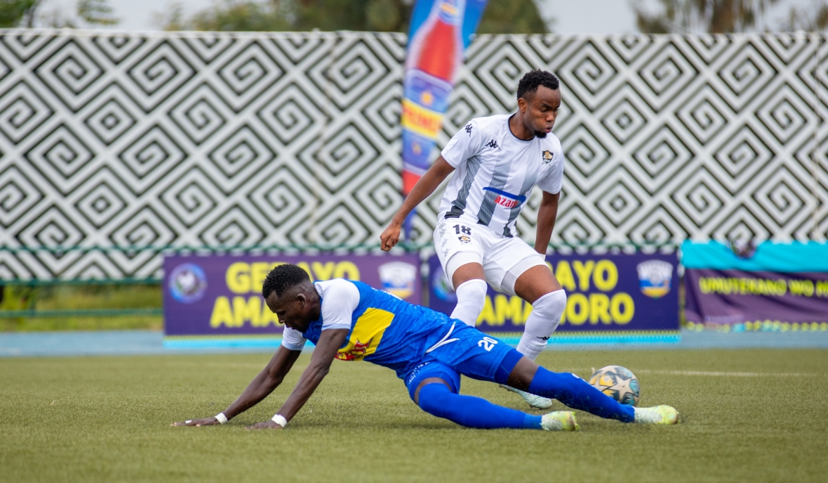 APR FC defender Prince Buregeya wins the ball against Rayon Sports&#039; player during a past derby at Huye Stadium on February 12, 2023. PHOTO BY OLIVIER MUGWIZA