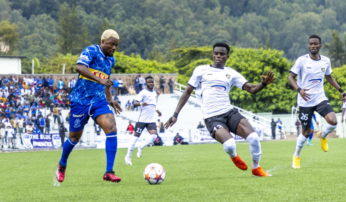 Rayon Sports striker Heritier Luvumbu dribbles past Army side defenders during a goalless derby at Kigali Pele Stadium on Sunday, October 29. All photos by Olivier Mugwiza