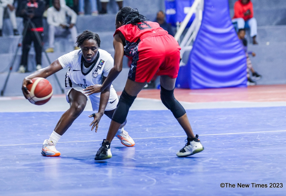 APR women basketball club point guard Odile Tetero  with the ball during the game as Army side defeating Burundian outfit Gladiators 86-68 at Lycée de Kigali gymnasium on Sunday, October 29. Photo by Dan Gatsinzi