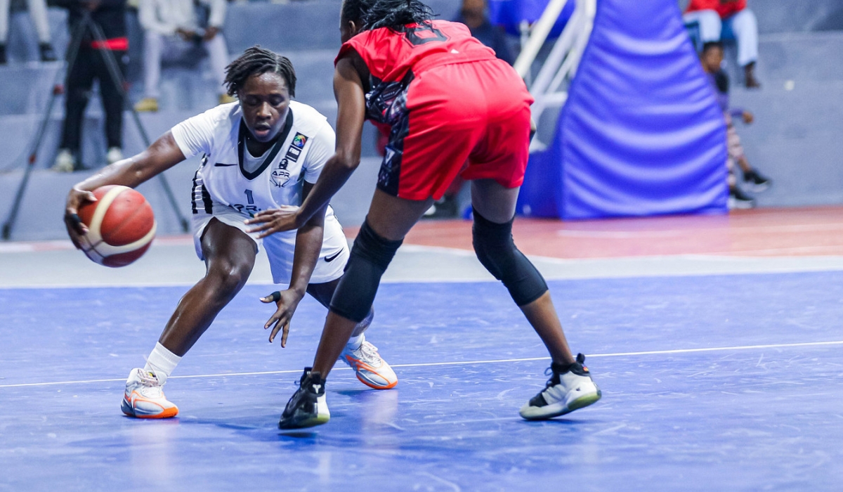 APR women basketball club point guard Odile Tetero  with the ball during the game as Army side defeating Burundian outfit Gladiators 86-68 at Lycée de Kigali gymnasium on Sunday, October 29. Photo by Dan Gatsinzi