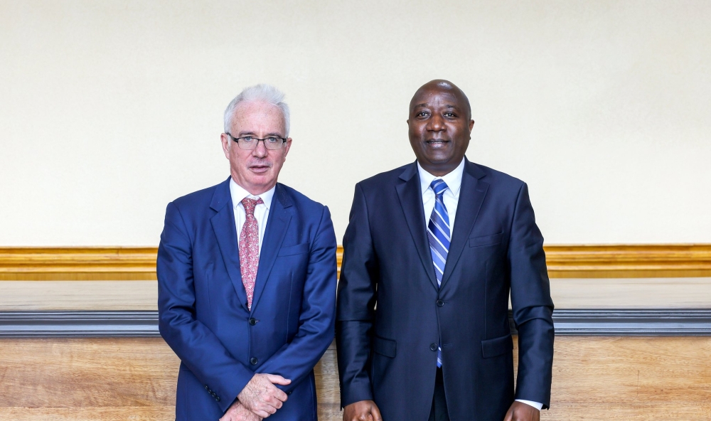 Prime Minister Edouard Ngirente and  Executive Director of Global Fund, Peter Sands pose for a photo. The officials held discussions centered on exploring ways to further strengthen the healthcare sector. Courtesy