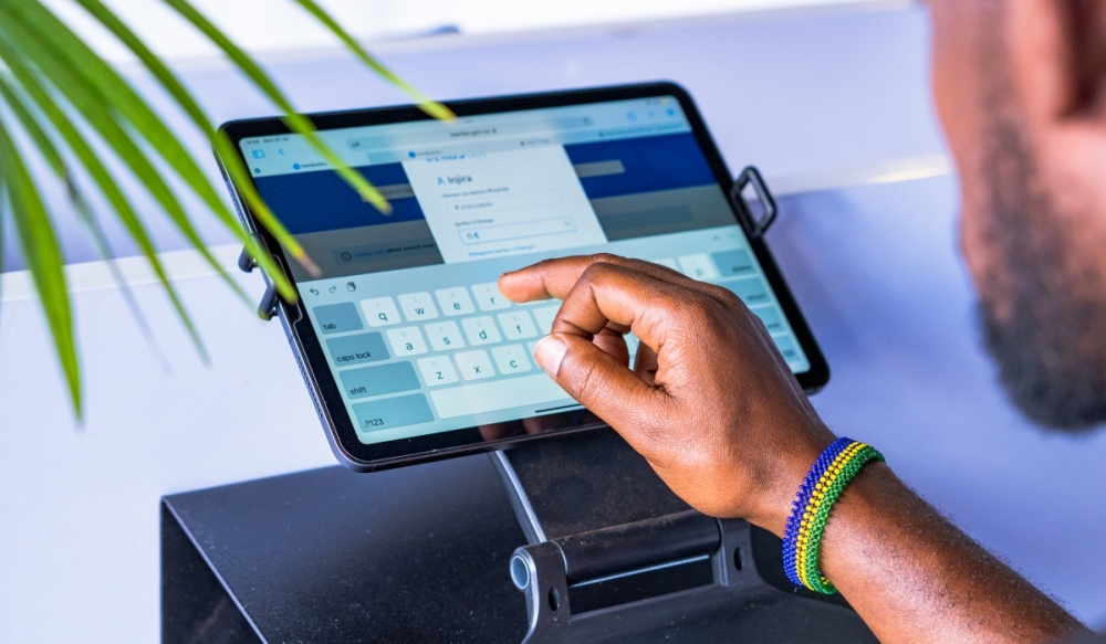 A citizen accessing government services using Irembo platform, an online portal that serves as a gateway to different government services. COURTESY