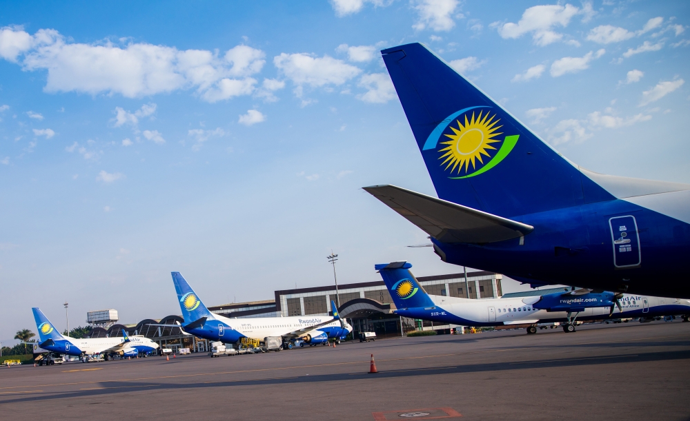Some of RwandAir&#039;s airplanes at Kigali International Airport. RwandAir expects to double its fleet to 25 planes over the next five years. PHOTO BY OLIVIER MUGWIZA