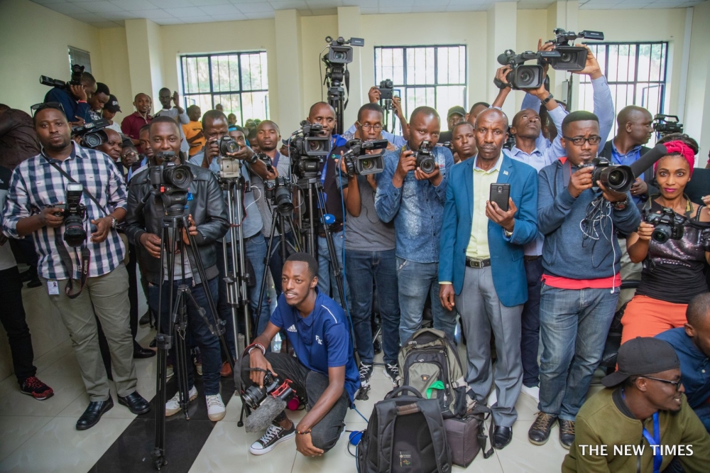 Journalists during a news coverage at Rwanda Investigation Bureau in 2020. RGB has revealed that 44.5 per cent of staff across all media house categories in Rwanda are paid a monthly salary of Rwf200,000 and below per month . File