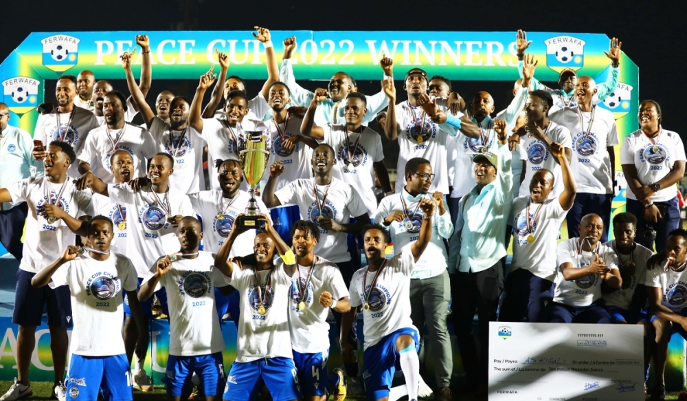 AS Kigali players and staff celebrate as they are crowned Peace Cup Champions after beating APR FC 1-0 at Kigali Stadium on June 28, 2021. Photo: Craish Bahizi.