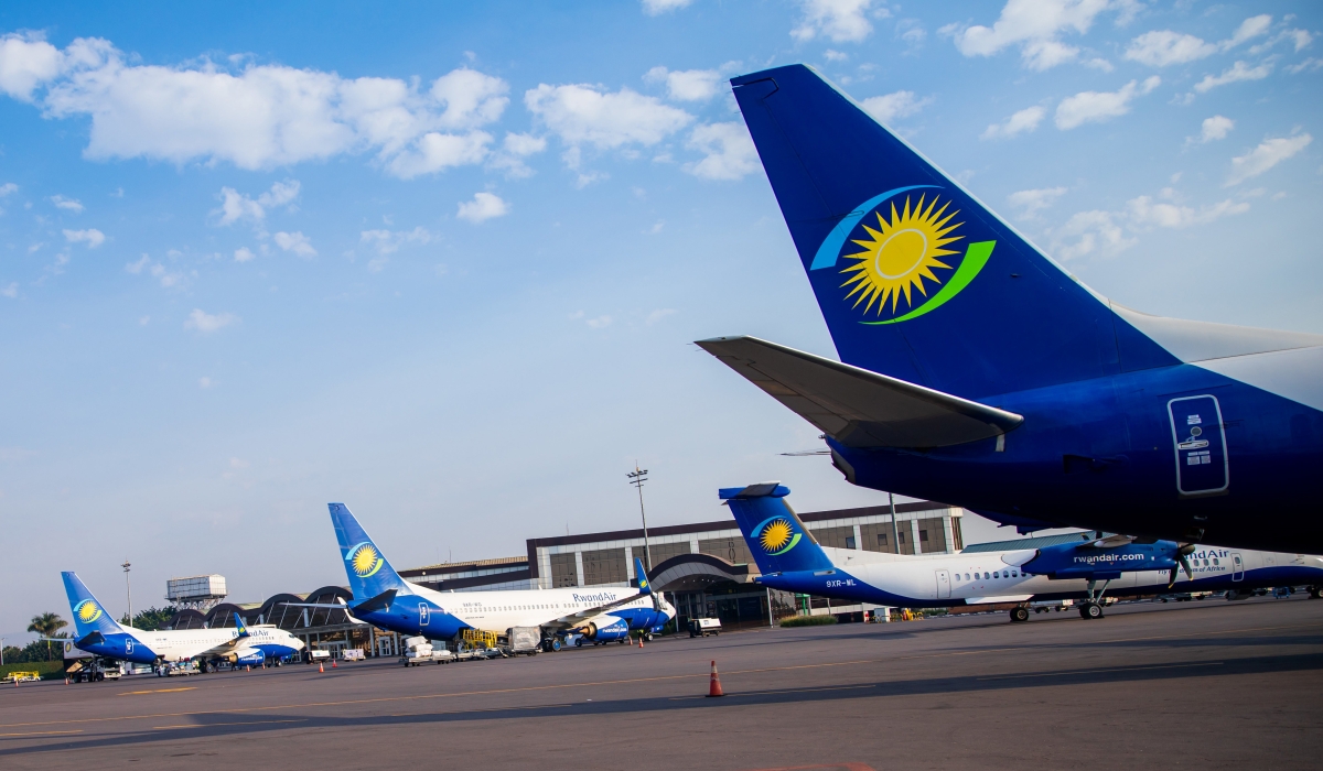 Some of RwandAir&#039;s airplanes at Kigali International Airport. RwandAir expects to double its fleet to 25 planes over the next five years. PHOTO BY OLIVIER MUGWIZA