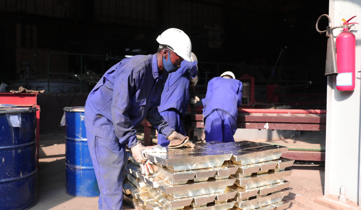 Workers arrange melted tin for export at LuNa Smelter in Kigali. Rwanda’s mineral exports raked in $241,823,194 worth of revenues in the third quarter (from July to September). SAM NGENDAHIMANA