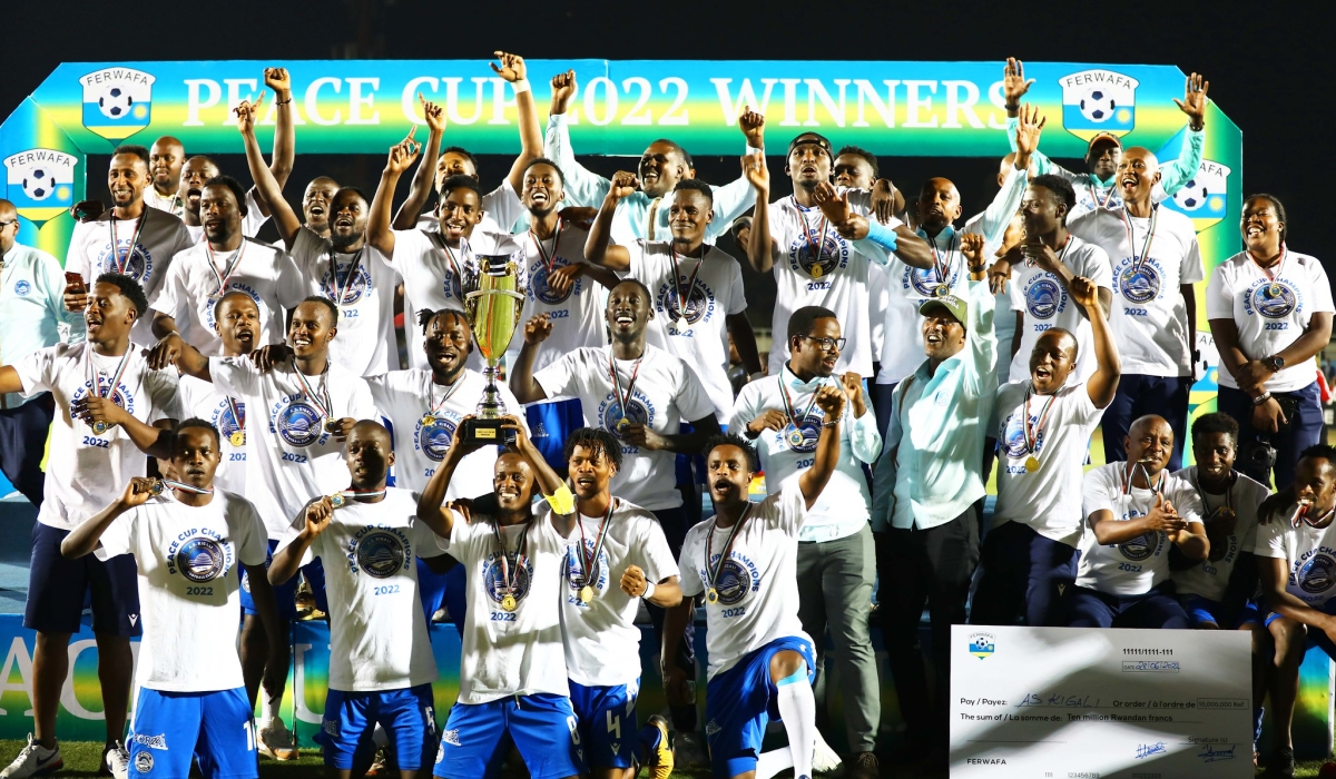 AS Kigali players and staff celebrate as they are crowned Peace Cup Champions after beating 1-0 APR FC at Kigali Stadium on June 28,2021. Photo by Craish Bahizi