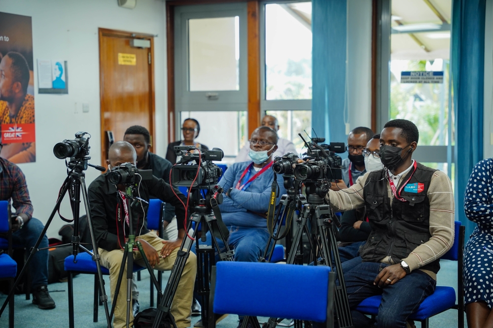 Journalists cover a news conference in Kigali.Craish Bahizi