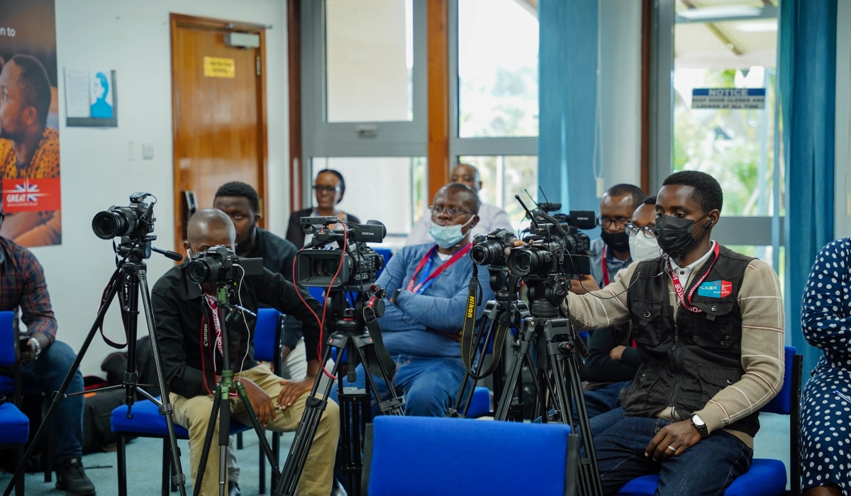 Journalists cover a news conference in Kigali.Craish Bahizi