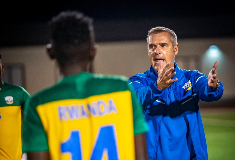 Amavubi head coach Torsten Frank Spittler gives instructions during a training session. Courtesy