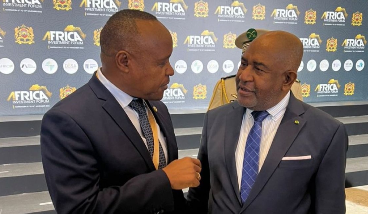 EAC Secretary-General Dr Peter Mathuki (left) converses with Comoros President Azali Assoumani, who is also the African Union Chairperson, on the sidelines of the Africa Investment Forum in Marrakech, Morocco, on November 8. PHOTO: POOL