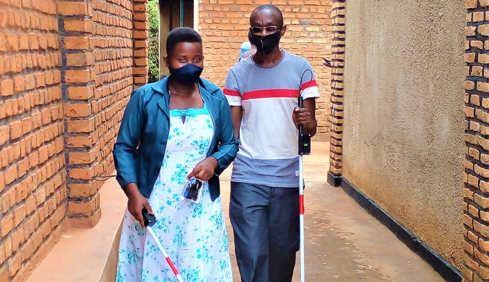 Visually impaired people with their white canes at Masaka in Kicukiro District. A walking stick costs average Rwf20,000 and with insurance cover it could go down to around Rwf2,000. PHOTO BY CRAISH BAHIZI
