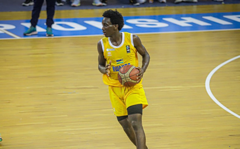 US-based point guard Sean Williams Mwesigwa during the game as he plays for under 16 national team