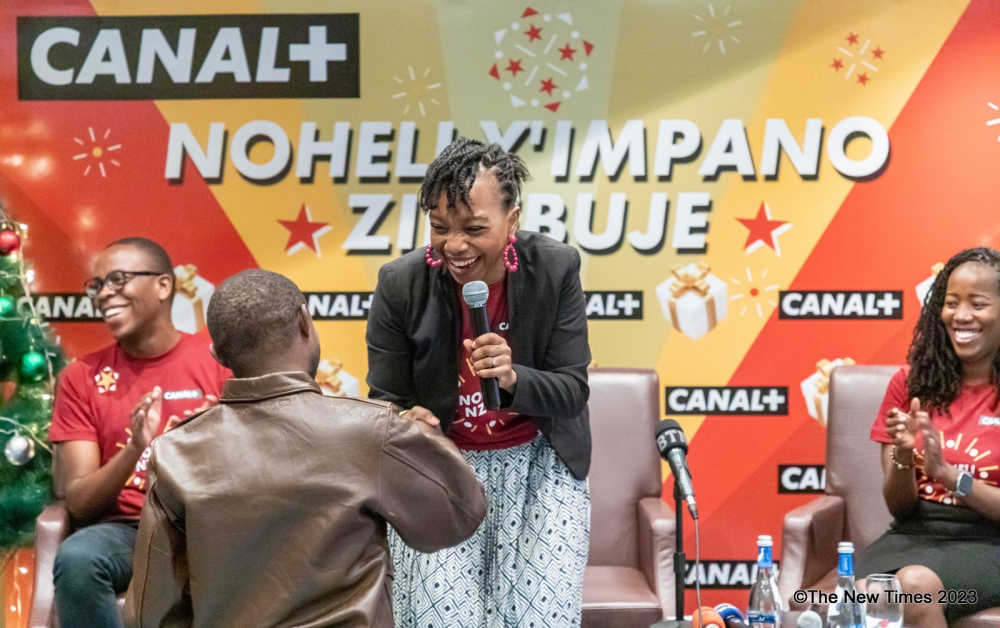 The Managing Director of Canal+ Sophie TCHATCHOUA, Interacting with a comedian  Niyitegeka Gratinen,one of the ambassadors of  CANAL +Rwanda. Dan Kwizera