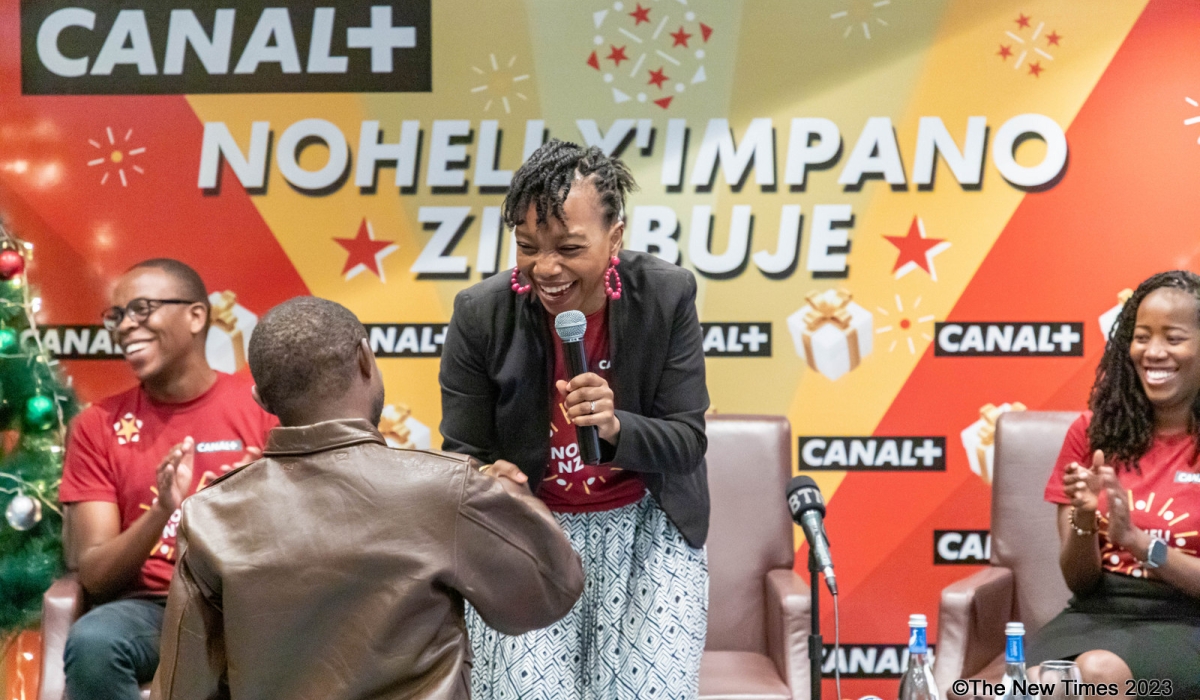 The Managing Director of Canal+ Sophie TCHATCHOUA, Interacting with a comedian  Niyitegeka Gratinen,one of the ambassadors of  CANAL +Rwanda. Dan Kwizera