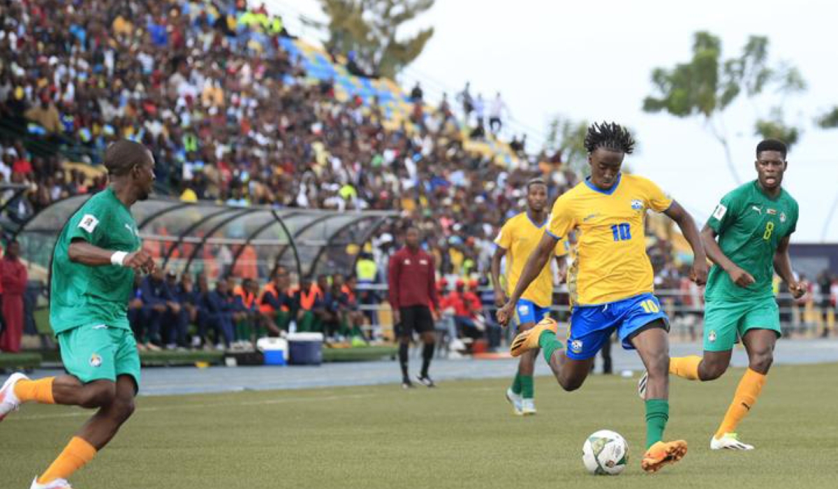 Rwanda&#039;s attacking midfielder Hakimu Sahabo controls the ball against Zimbabwe players during a goalless draw at Huye Stadium. Olivier Mugwiza