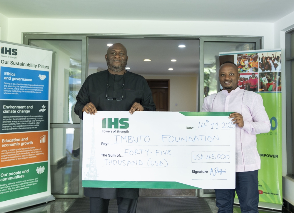 Kunle Iluyemi, Head of Sub Sahara Africa Region, IHS Towers and Jackson Vugayabagabo, Imbuto Foundation’s acting Director General during the handover of the support. COURTESY