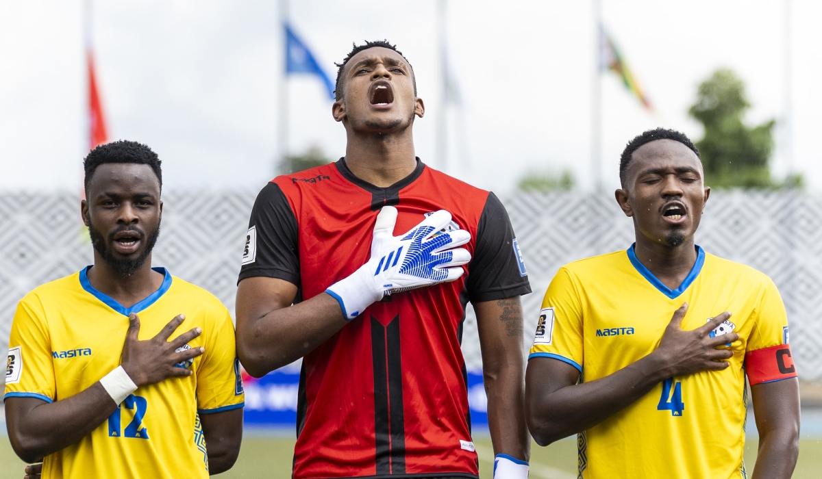 Rwanda&#039;s players Gilbert Mugisha, Fiacre Ntwari and skipper Djihad Bizimana sing the national anthem at the clash against Zimbabwe at Huye stadium on November 16. Olivier Mugwiza