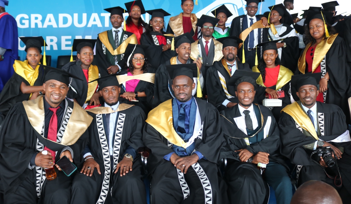 Some of the graduates pose for a photo at the graduation day. Photo by CRAISH BAHIZI