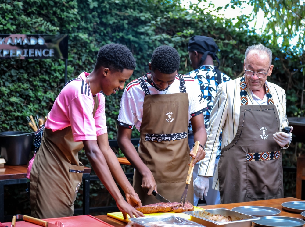 Guests prepare meat at the Kamado Experience. Photos by Dan Kwizera