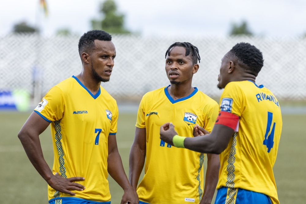 Amavubi captain Djihad Bizimana speaks to Patrick Sibomana and Kevin Muhire during a goalless draw against Zimbabwe at Huye stadium. They take on South Africa in dicey Africa 2026 World Cup Group C qualifier at the Huye Stadium.
