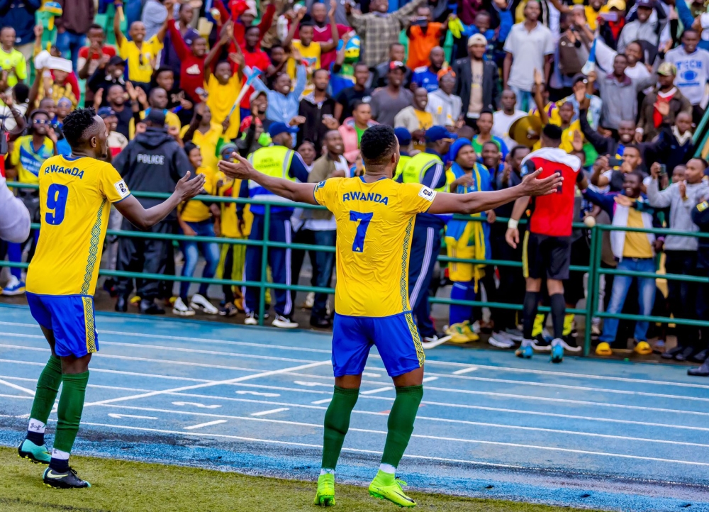 National team players and Amavubi supporters celebrate after beating  Bafana Bafana  2-0 match at Huye Stadium on Tuesday. Courtesy