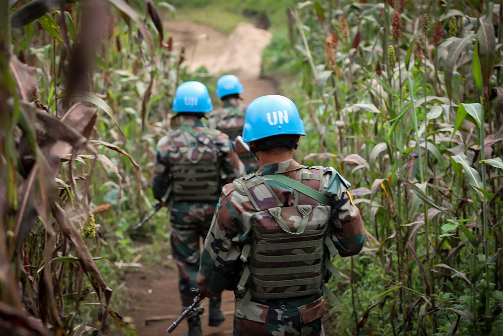 Peacekeepers serving with the United Nations Stabilization Mission in the Democratic Republic of Congo (MONUSCO) patrol on foot in North Kivu province. Courtesy Photo