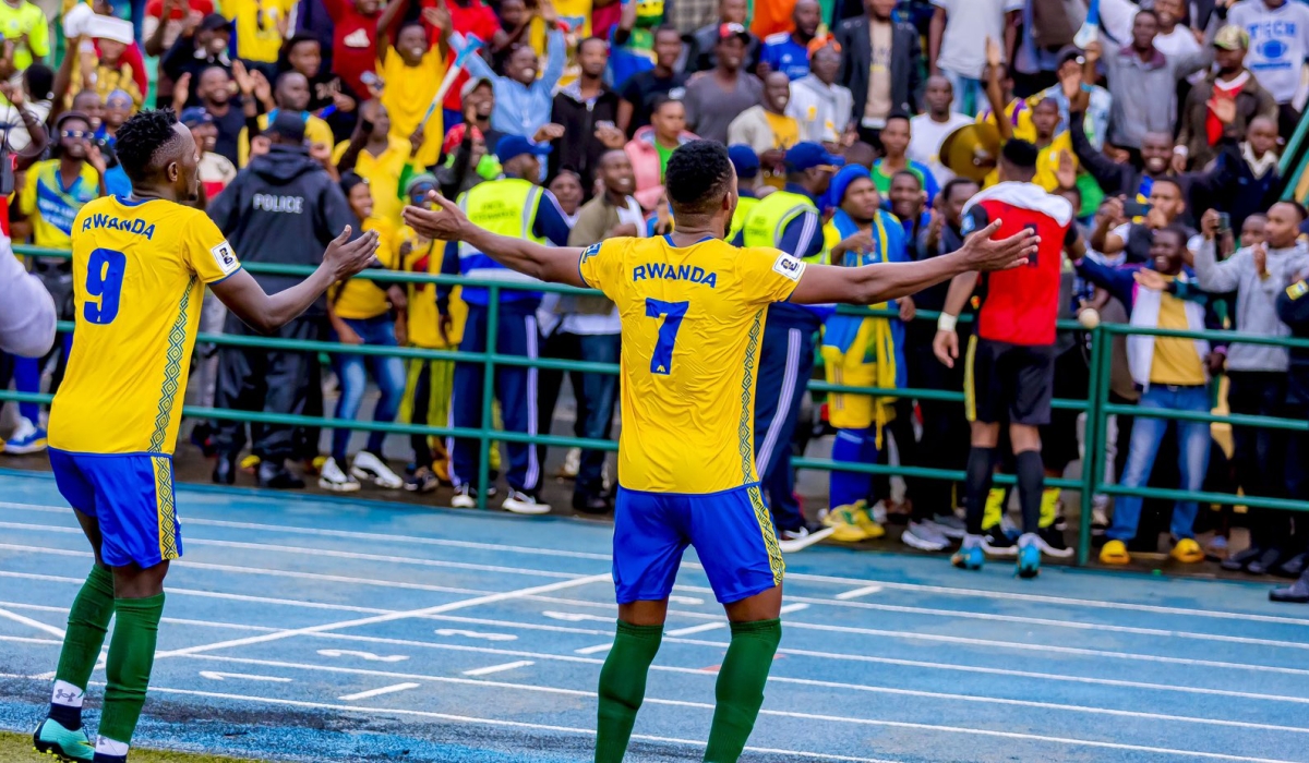 National team players and Amavubi supporters celebrate after beating  Bafana Bafana  2-0 match at Huye Stadium on Tuesday. Courtesy