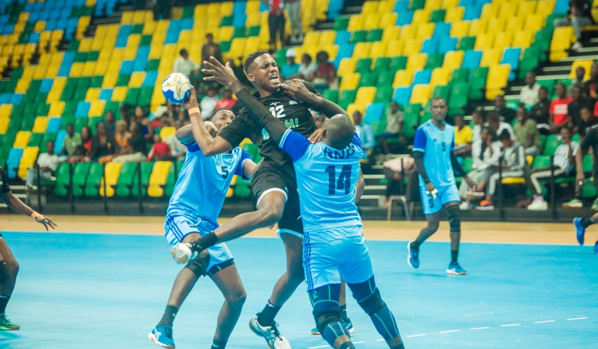 Police Handball team players vie for the ball with APR handball&#039;s player during a league game. At least nine team will take part in the 2023 Coupe du Rwanda handball tournament. FILE