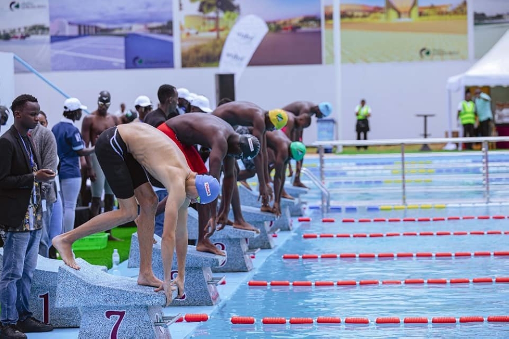 Isiaka Iradukunda ( 2nd from left) struck two medals in the opening day of the Africa Aquatics Zone 3 Swimming Championship which is underway in Kigali-courtesy
