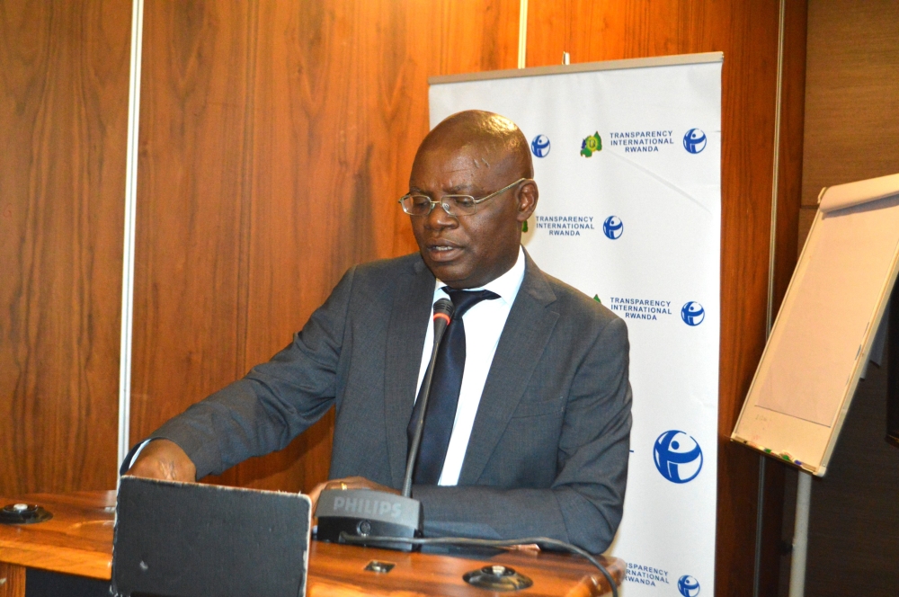 Transparency International (T.I) Rwanda Executive, Appollinaire Mupiganyi delivers remarks during the presentation of the report on Friday, November 24. Courtesy 