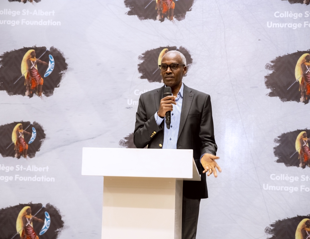 Charles Murigande,  addresses delegates at the event.