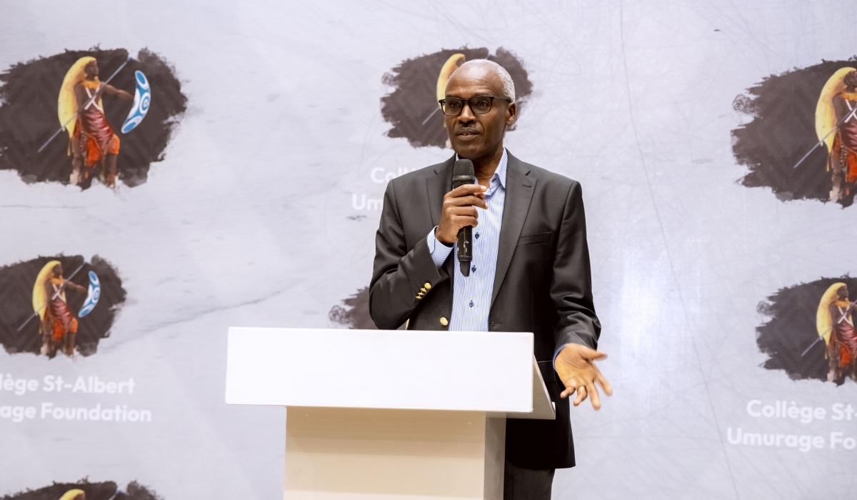 Charles Murigande,  addresses delegates at the event.