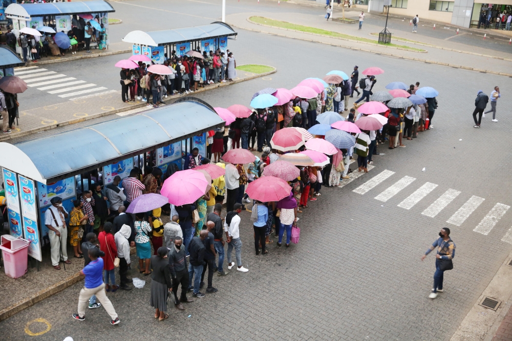 Passengers stranded at Downtown Taxi park  in Kigali on February 8. Photo by Craish Bahizi