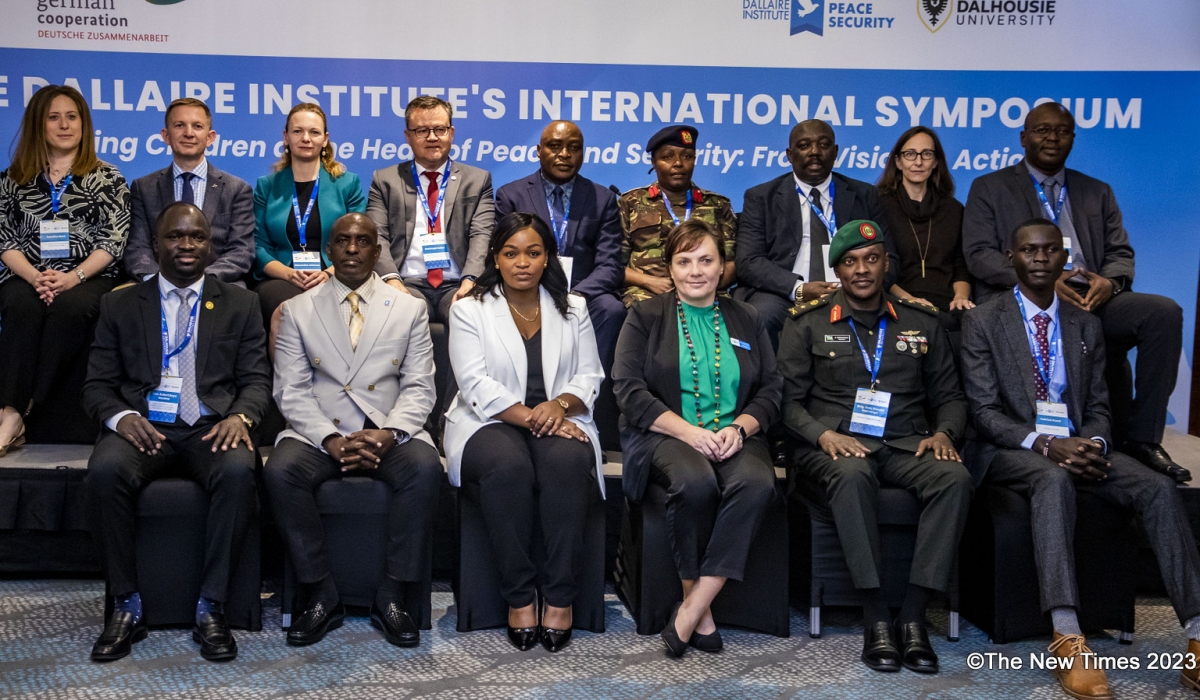 Delegates pose for a group photo during the opening session of the two-day 5th annual symposium in Kigali. All photos by Emmanuel Dushimimana