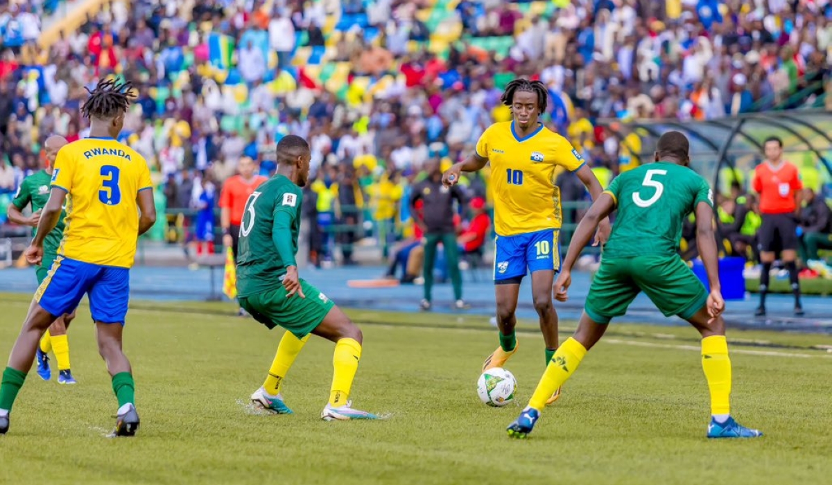 National team attacking midfielder Hakim Sahabo tries to go past Bafana Bafana players during a 2-0 game at Huye Stadium. COURTESY