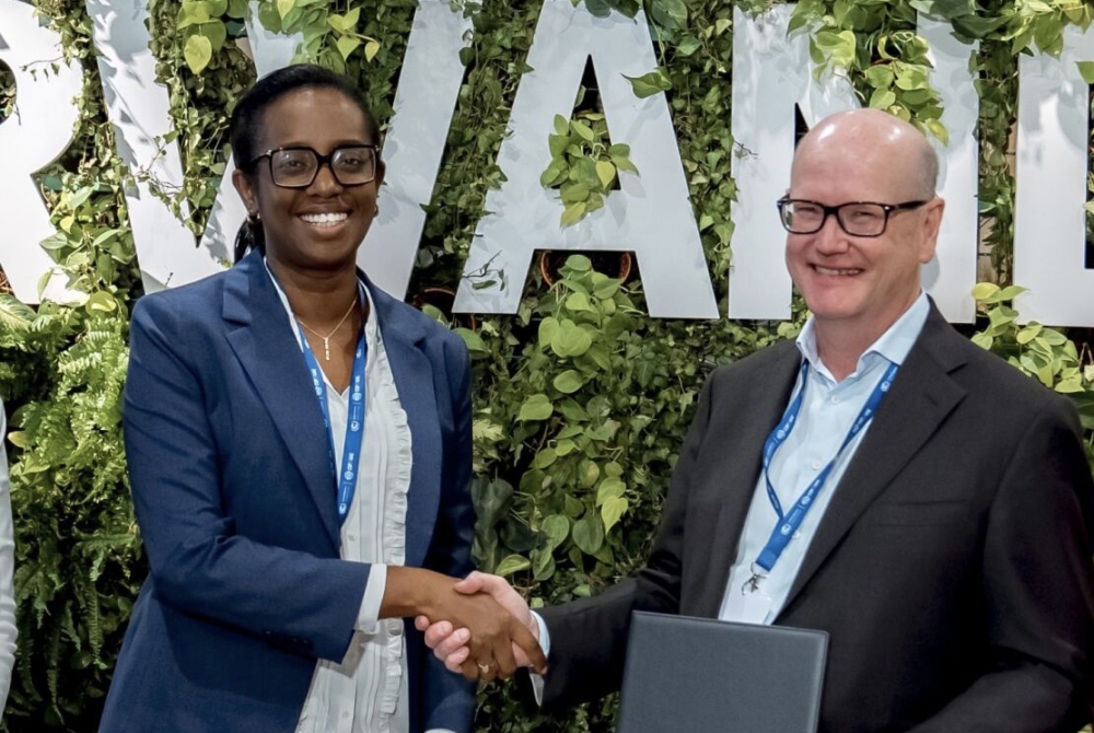 Diane Karusisi, the CEO of Bank of Kigali  and Thomas Östros, the Vice President of the European Investment Bank during the signing of the agreement at COP28 in Dubai, on December 2. Courtesy