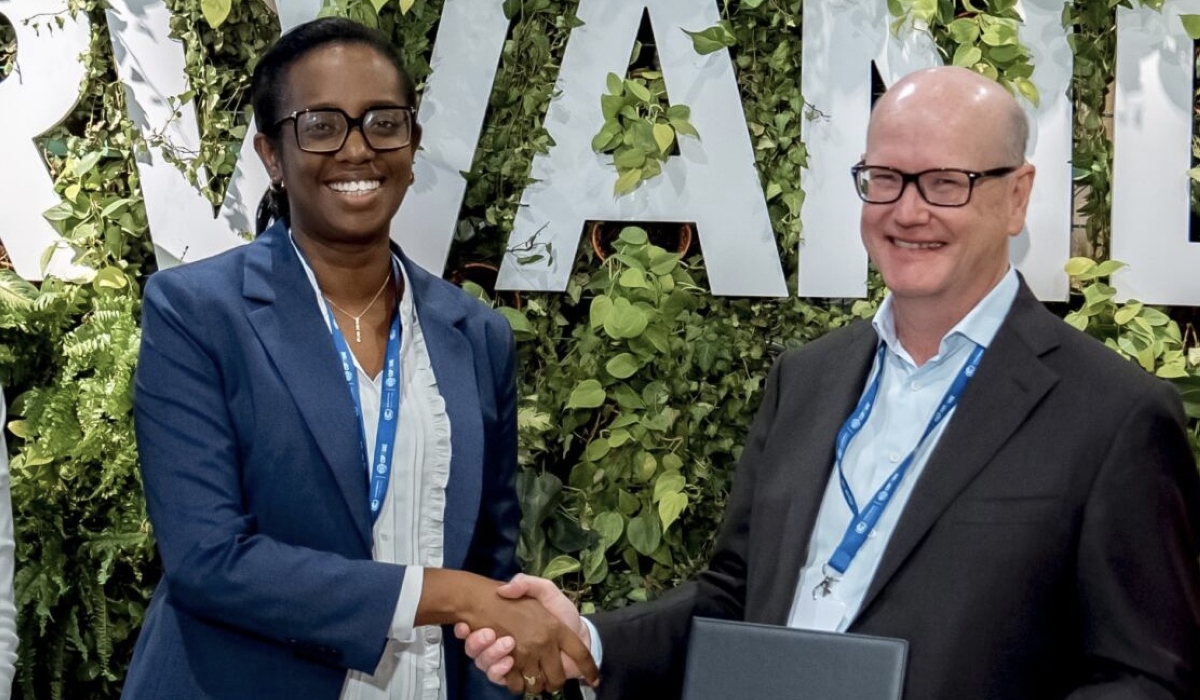 Diane Karusisi, the CEO of Bank of Kigali  and Thomas Östros, the Vice President of the European Investment Bank during the signing of the agreement at COP28 in Dubai, on December 2. Courtesy