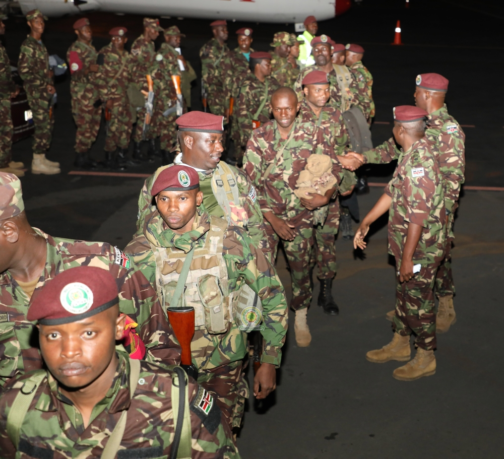 Kenyan troops under the East African Community Regional Force (EACRF) boarding a plane. EACRAF announced that it will hand over to troops from the Southern African Development Community (SADC). Courtesy