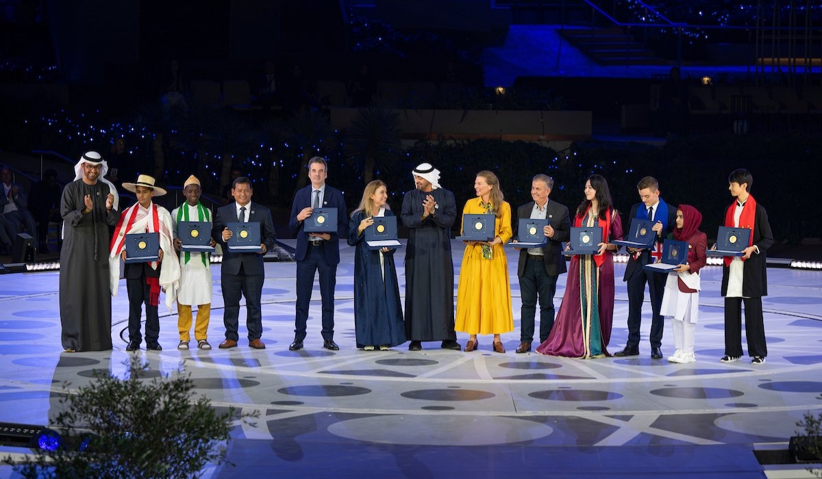 Ignite Power co-founder Angela Homsi (6th from left) in a group photo with other winners of the 15th Zayed Sustainability Prize, and UAE leaders, in Dubai, on December 2, 2023. COURTESY
