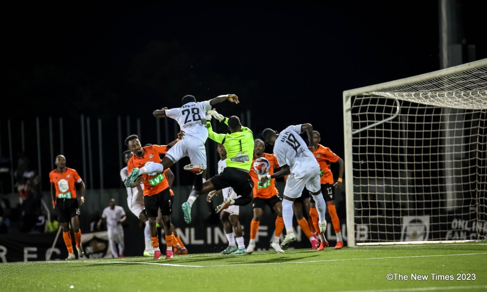 APR FC  and  Gasogi  United players vie for the ball as they play a goalless draw at Kigali Pelé Stadium on Tuesday, December 5. Despite the result, APR maintained their lead at the summit of the table standings with 27 points. All photos by Dan Gatsinzi