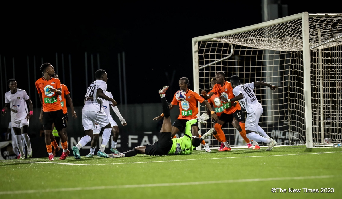 APR FC and Gasogi United players vie for the ball during a goalless draw on matchday 13 of the Primus National League Monday evening. PHOTO BY DAN GATSINZI
