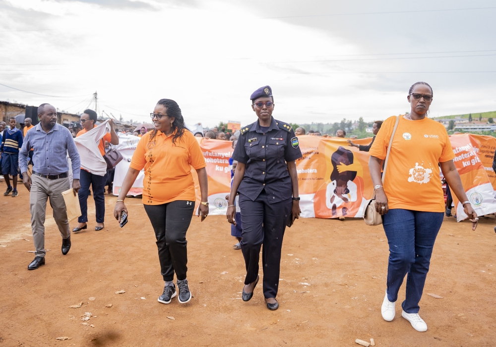 Officials lead hundreds of participants during a walk to sensitise to people on Gender Based Violence in Kigali on Thursday, December 7. Photos by Emmanuel Dushimimana