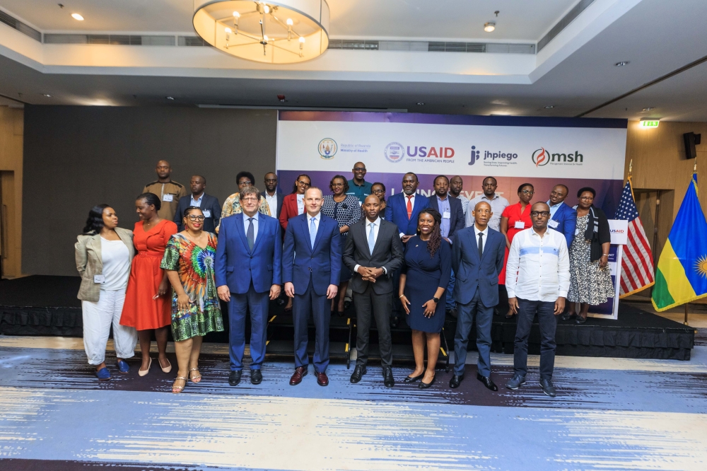 Officials pose for a grouphoto as   as USAID announced the two projects Ireme (&#039;Quality&#039;) and Tubeho (&#039;Let’s live&#039;),    On December 8, in Kigali. Courtesy.