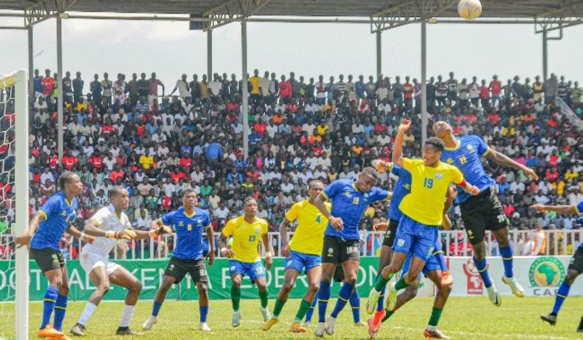 Rwanda skipper Kennedy Hoziana goes for an aerial ball in the third place game against Tanzania 