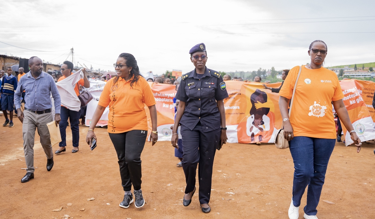 Officials lead hundreds of participants during a walk to sensitise to people on Gender Based Violence in Kigali on Thursday, December 7. Photos by Emmanuel Dushimimana